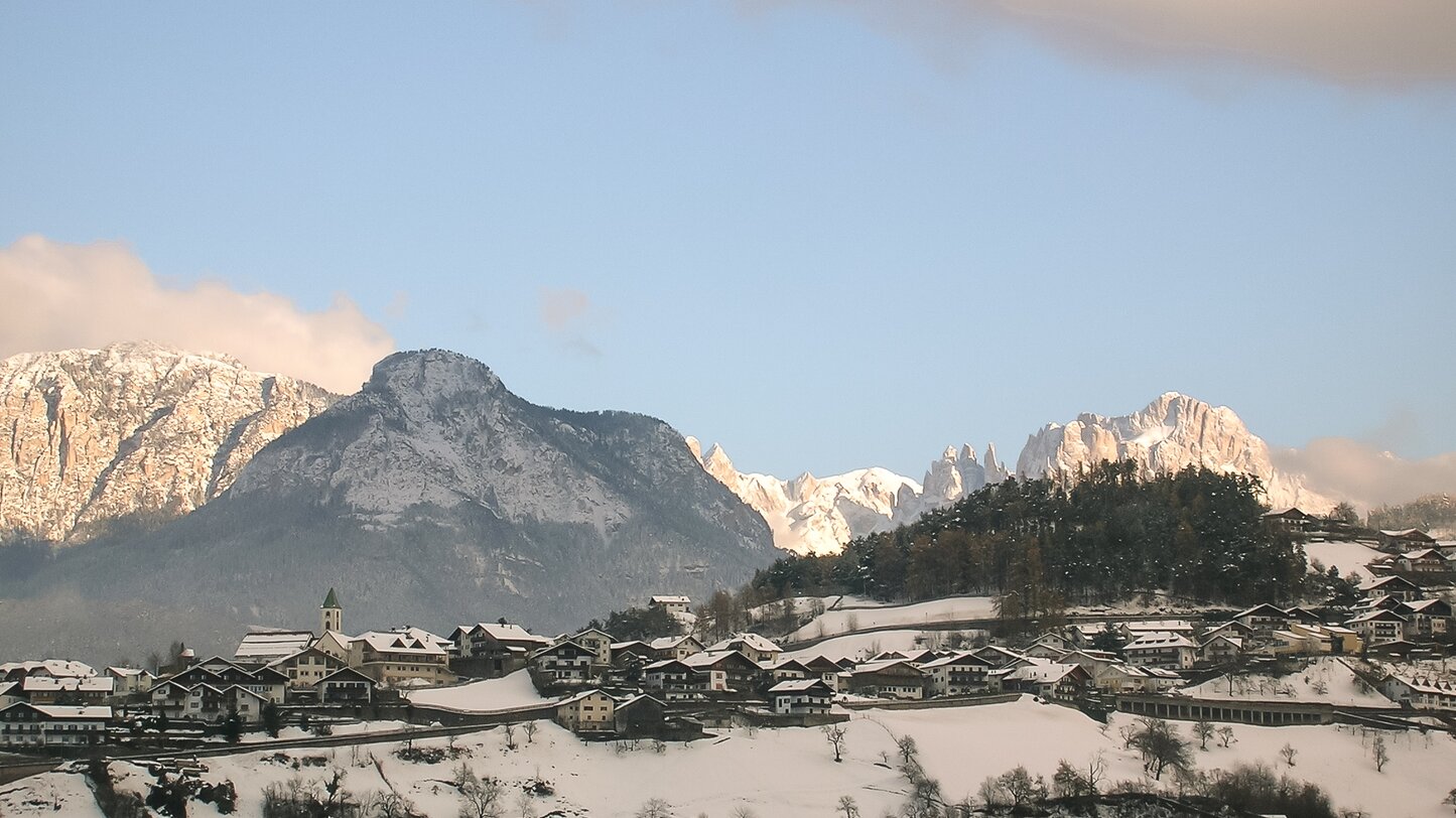 Snow-covered Steinegg with Rosengarten | © TV Steinegg