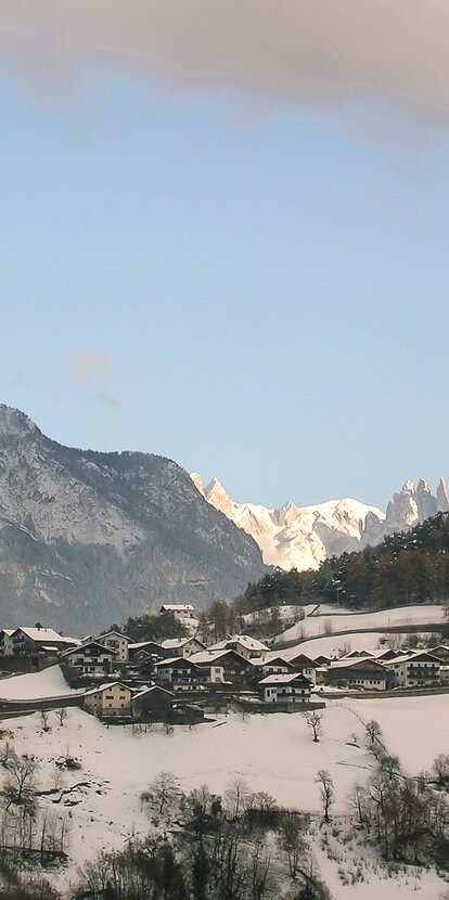 Snow-covered Steinegg with Rosengarten | © TV Steinegg