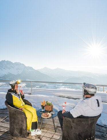 Aperitif Skier Terrace Laurins Lounge Sunset | © Carezza Dolomites/Harald Wisthaler