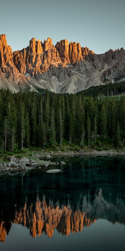 Evening sun Latemar Lake Carezza | © Gabriel Eisath