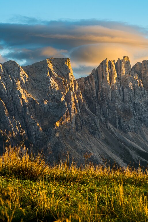 Latemar clouds blue skies autumn meadow | © Valentin Pardeller