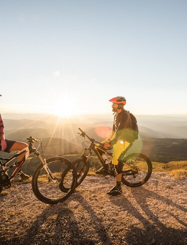 Moutain biker vista tramonto Alpi | © Eggental Tourismus/Harald Wisthaler