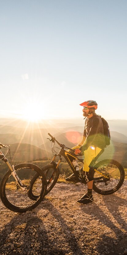 Mountain biker sunset view Alps | © Eggental Tourismus/Harald Wisthaler