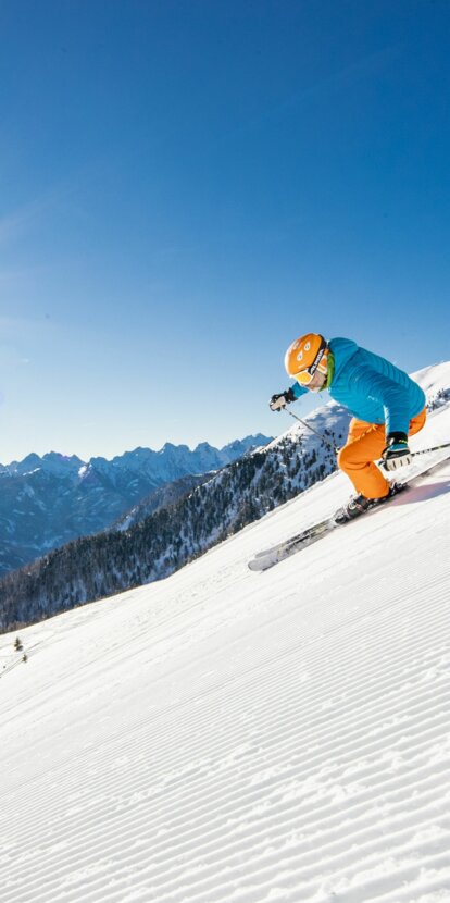 sciatore panorama sole montagne inverno | © Ph. Federico Modica